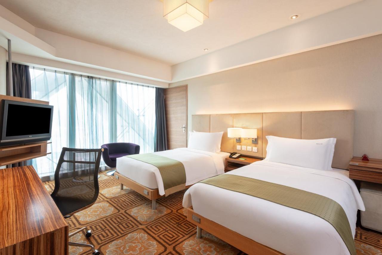 Holiday Inn Binhai Tianjin Zimmer foto